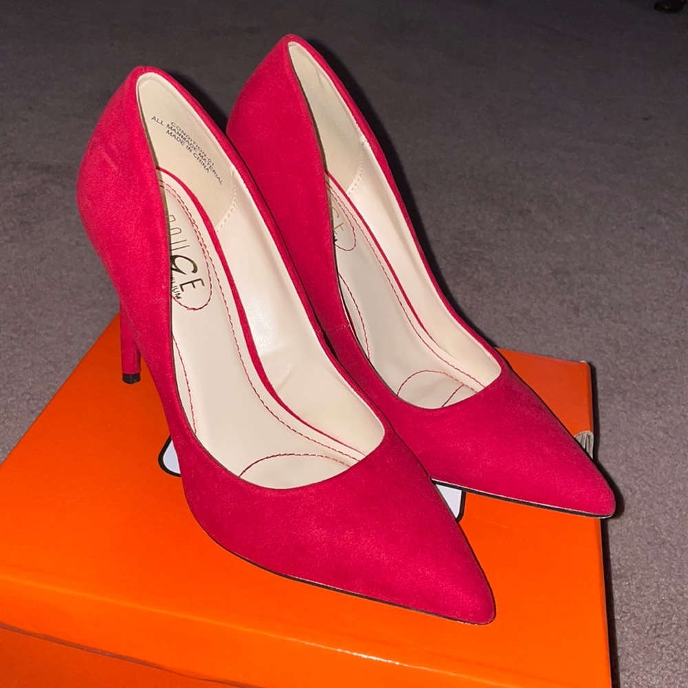 Red pumps! Worn only once briefly for a costume